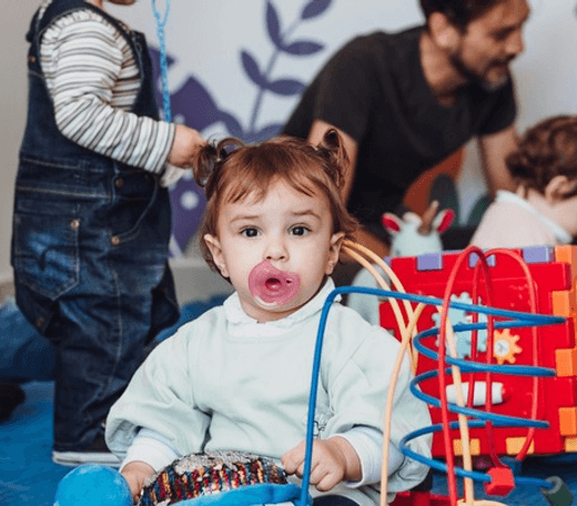 Children playing under a fabric canopy at Quokka Kids in Beaver Dam, WI