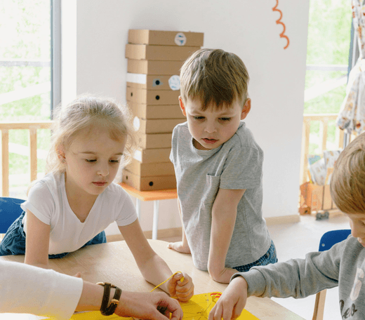 Children practicing routines and transitions in a supportive classroom at Quokka Kids